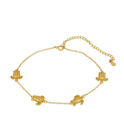Tobillera Chelonia chapada en oro 18K con tortugas marinas
